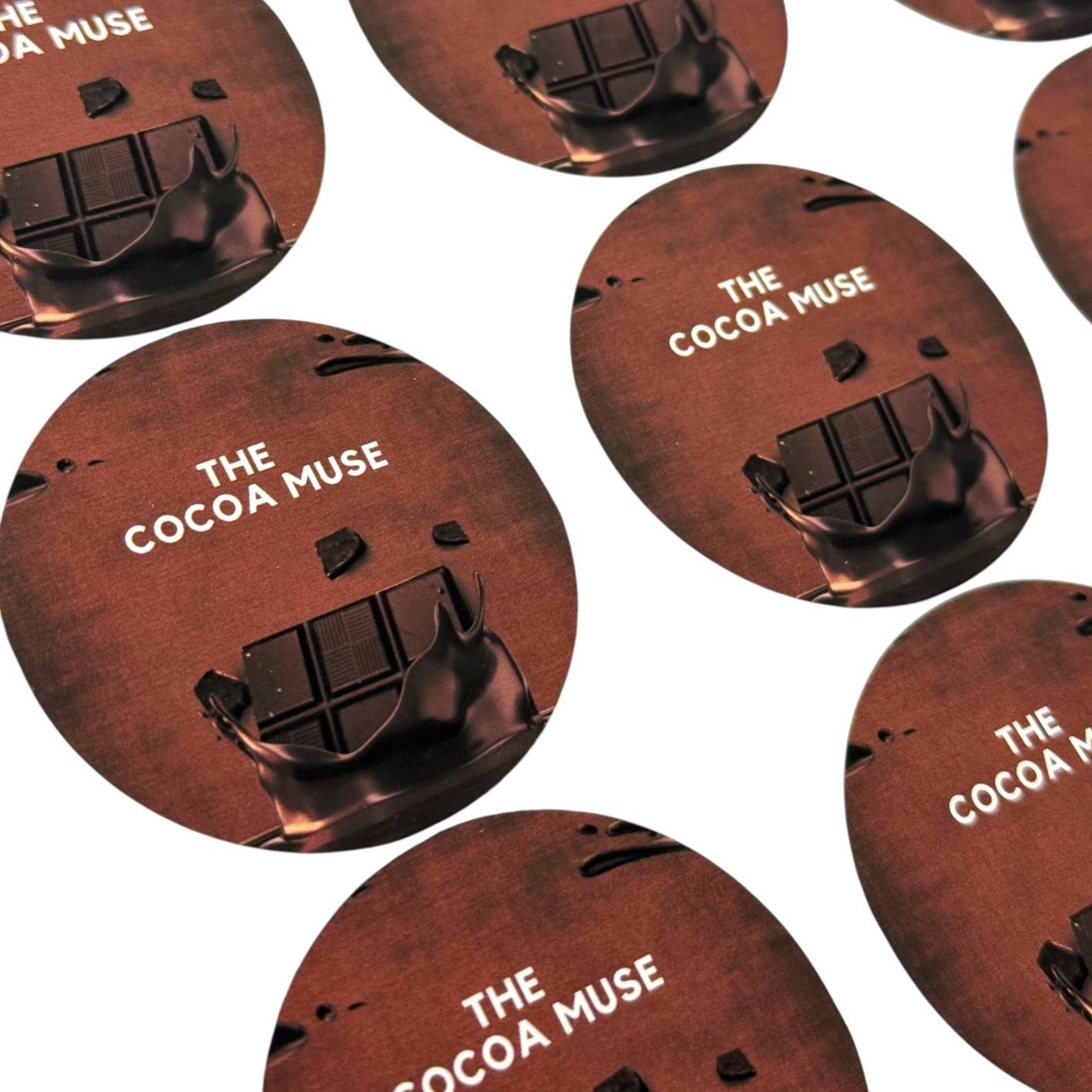 Round brown custom stickers with chocolate logo.