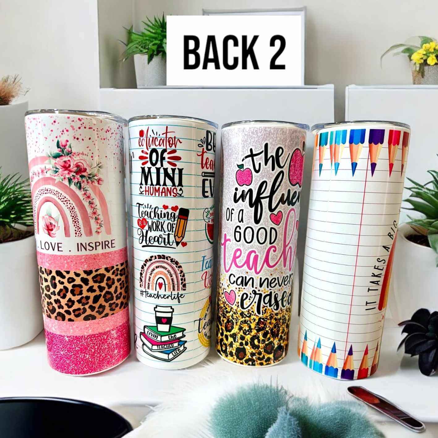 Reverse side of custom teacher tumblers displaying 'Love Inspire' floral design, 'Educator of mini humans' quote, and 'The influence of a good teacher' message - personalised gifts Melbourne