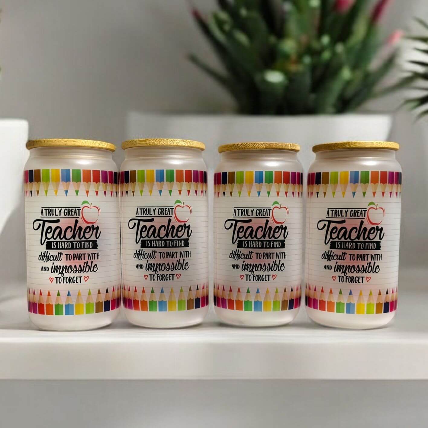 et of four personalised teacher glass cans with bamboo lids featuring colourful pencil design and 'A truly great teacher is hard to find' quote - custom teacher appreciation gifts Melbourne Australia