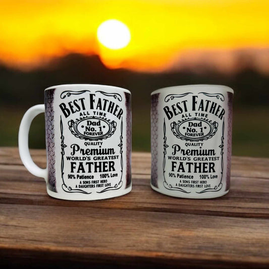 Two 'Best Father' mugs on a wooden surface with a sunset background Customised with Dads name