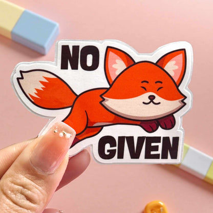 Sticker of a fox with 'No Given' text held by a hand on a pink background and cute stationery