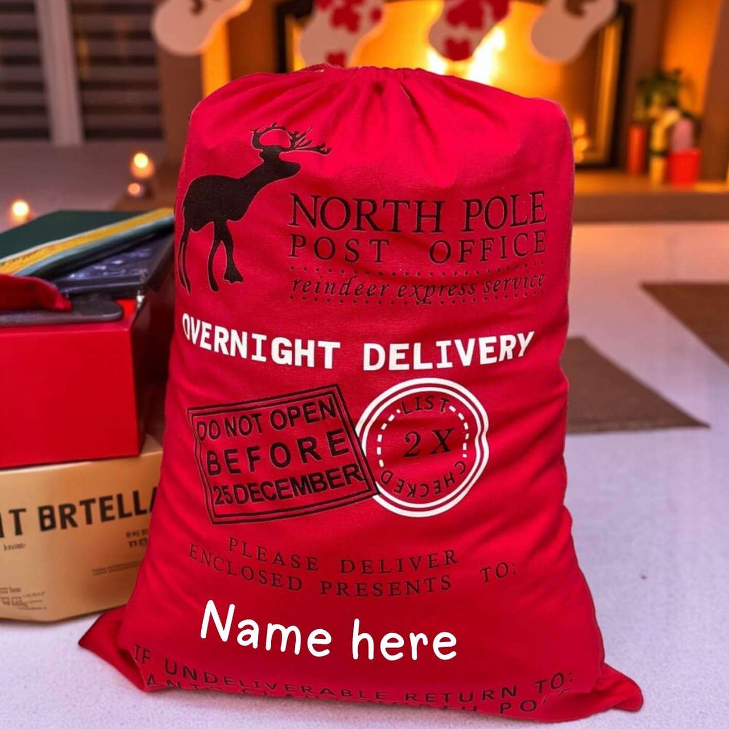 Red sack with 'North Pole Post Office' text and decorative elements on a festive background.